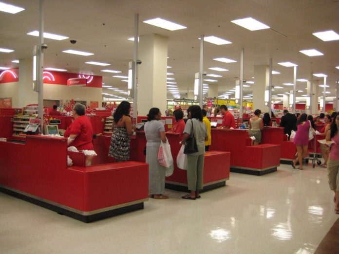 Cashiers ringing up sales