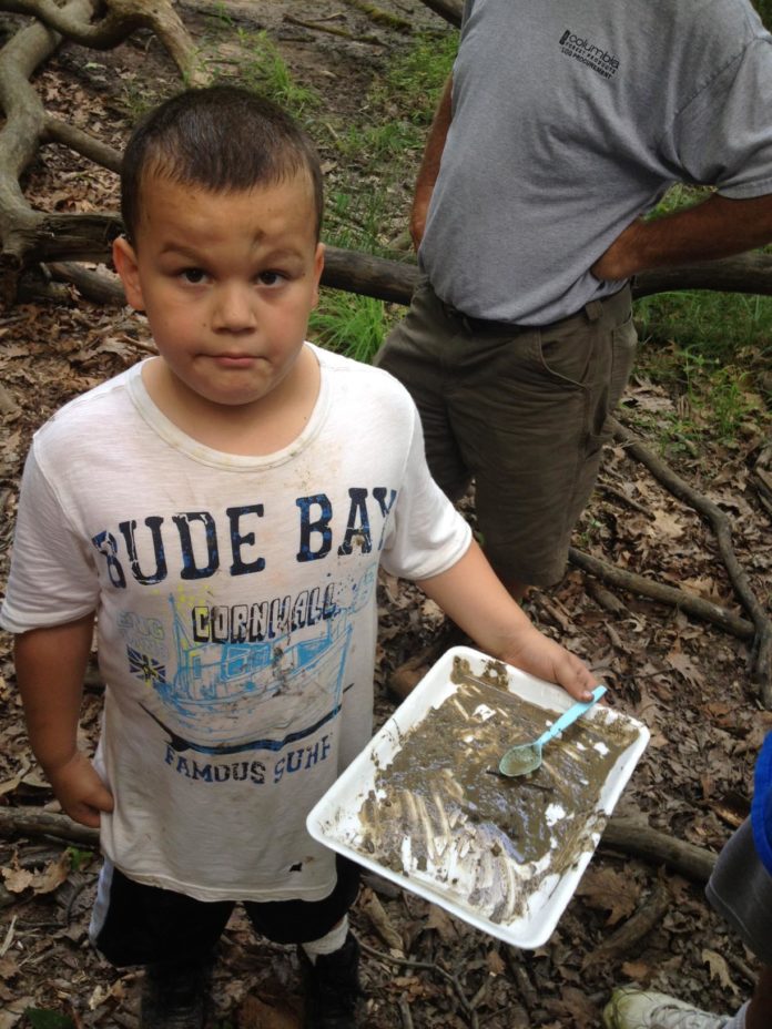 Cub Scout Brayden Hayes Cub Scout Brayden Hayes searching for critters at Poet's Walk