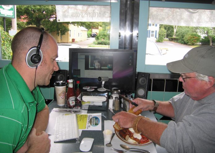Matthew Slaats watches Don Gavin enjoy an Ulster Fry