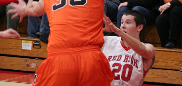 Nick Michitsch tries to pass from his knees
