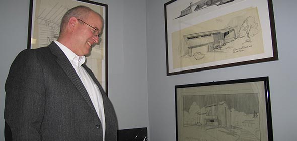 Tim Lynch reviews plans in his office