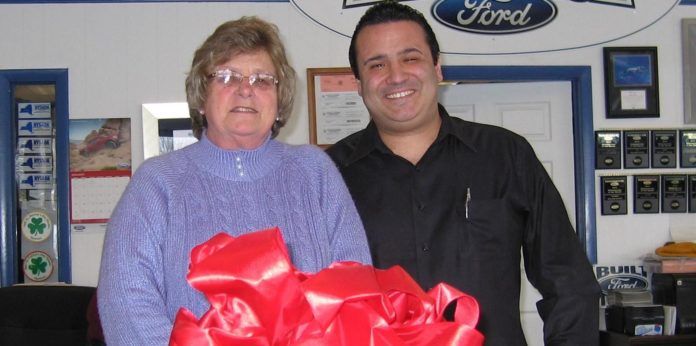 Shirley Rabbett and Lann Rubin with gift-wrapped Ford_Rhinebeck
