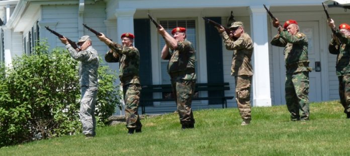 The Red Hook VFW color guard salutes our veterans at the Milan Memorial Day ceremony at Milan Town Hall May 25. (800x356)