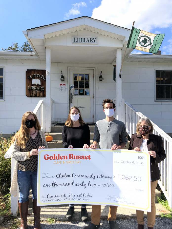 Clinton Library Golden Russet Cafe donation The Cavallos present their donation check to the Clinton Library on October 6. (L to r) Carol Bancroft, Library Director; Jenny & Craig Cavallo, co-owners Golden Russet Cafe & Grocery; Mary Pat Sternberg, Clinton Library Board of Trustees President