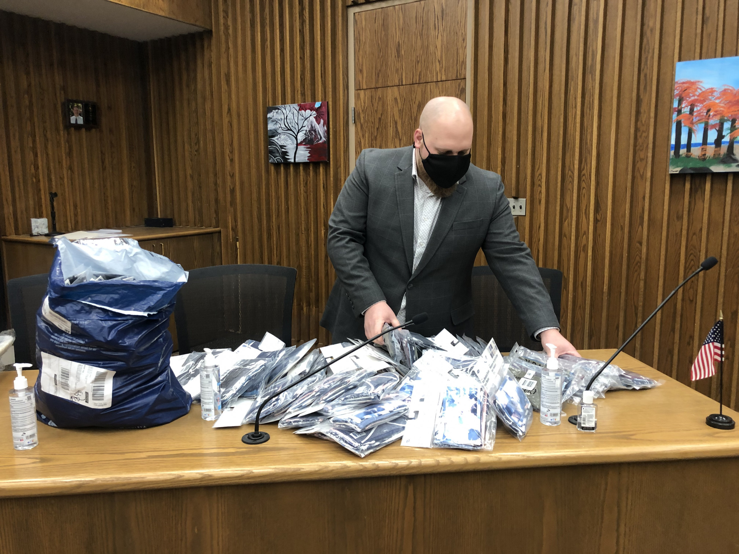 Councilmember Evan Menist organizing the Mask Up PK care packages.