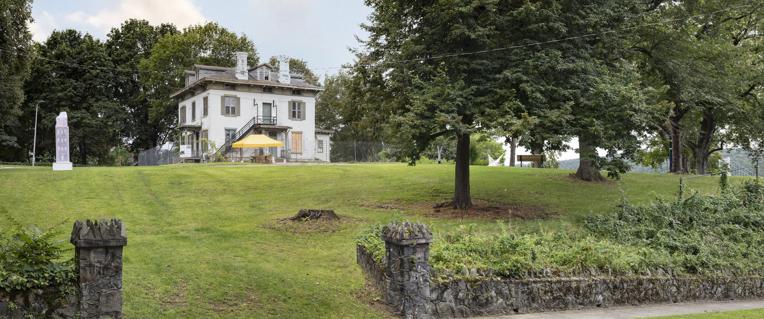 Photograph of historic Pelton Mansion at Wheaton Park and surrounding lawn. Photo copyright Sean Hemmerle, 2021.